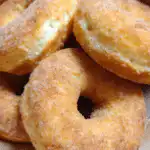 baked sourdough discard donuts on a rustic plate